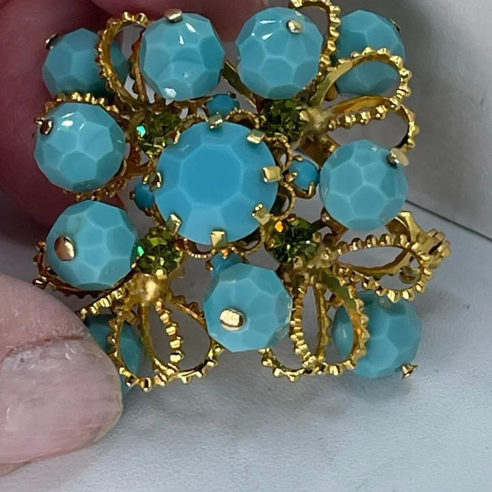 Vintage Made in Austria light blue green AB beads.